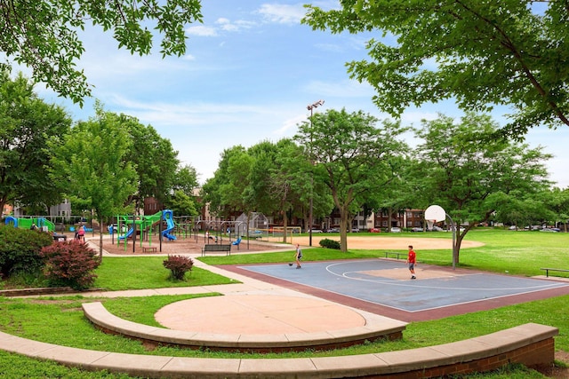 2840 Bryant Ave S Unit E303, Minneapolis, MN 55408 - view of sport court featuring a lawn and community basketball court