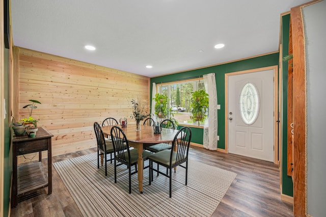 3108 4th Ave, Grand Rapids, MN 55744 - dining space with wooden walls, recessed lighting, baseboards, and wood finished floors
