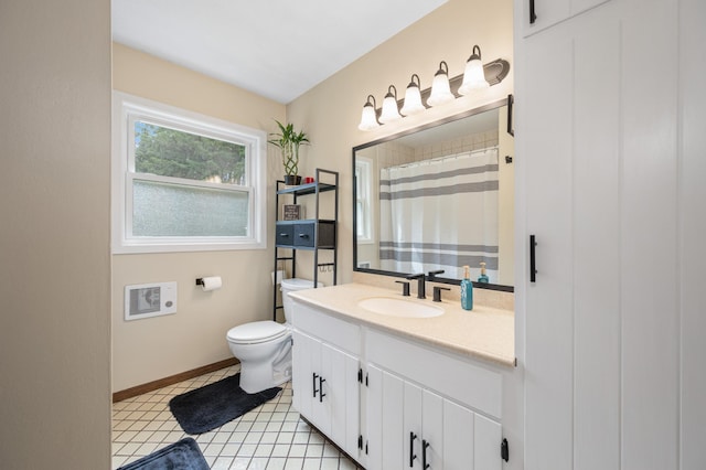 3108 4th Ave, Grand Rapids, MN 55744 - full bathroom featuring vanity, toilet, baseboards, tile patterned flooring, and curtained shower