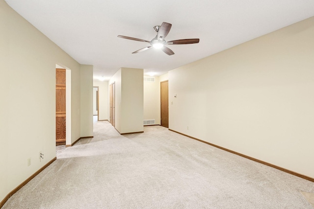 10726 Toledo Ct, Bloomington, MN 55437 - unfurnished room with ceiling fan, light carpet, and baseboards
