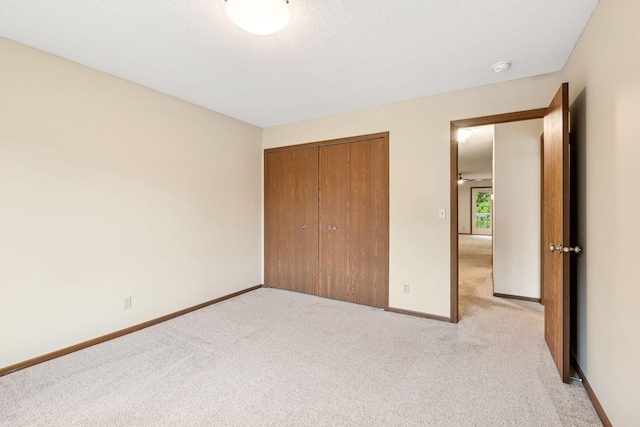 10726 Toledo Ct, Bloomington, MN 55437 - unfurnished bedroom with light carpet, a closet, and baseboards