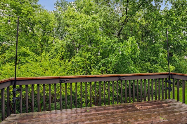10726 Toledo Ct, Bloomington, MN 55437 - wooden deck featuring a view of trees
