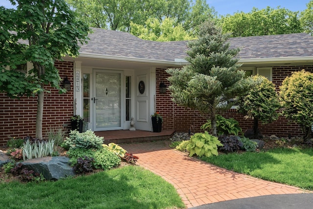6413 Mendelssohn Ln, Edina, MN 55343 - property entrance featuring brick siding and roof with shingles