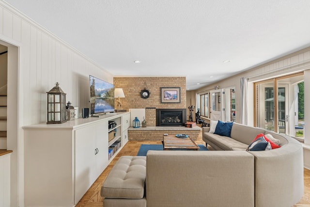 6413 Mendelssohn Ln, Edina, MN 55343 - living area featuring a fireplace and crown molding