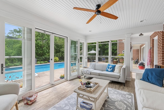 6413 Mendelssohn Ln, Edina, MN 55343 - sunroom featuring wood finished floors and wooden ceiling