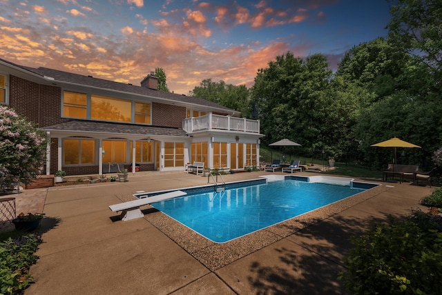 6413 Mendelssohn Ln, Edina, MN 55343 - swimming pool with a patio area and a diving board