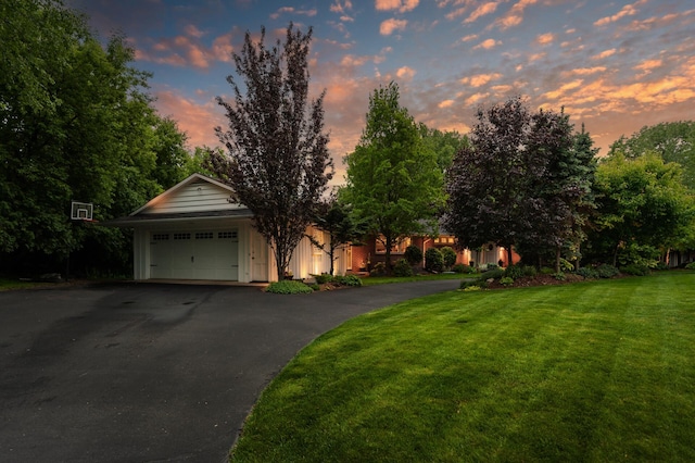 6413 Mendelssohn Ln, Edina, MN 55343 - view of front of house featuring asphalt driveway, an attached garage, and a lawn