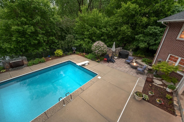 6413 Mendelssohn Ln, Edina, MN 55343 - view of swimming pool with a fire pit, a patio area, and a diving board
