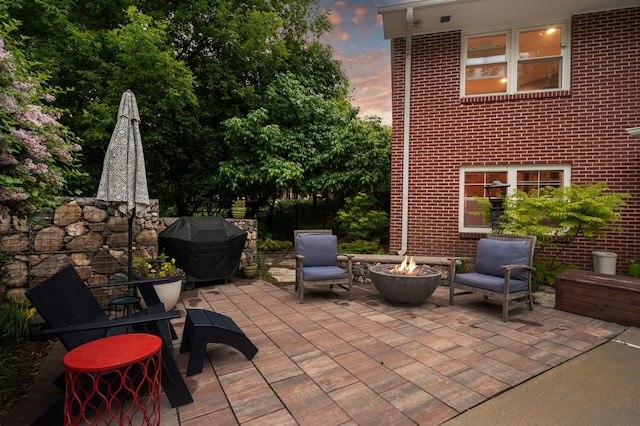 6413 Mendelssohn Ln, Edina, MN 55343 - view of patio / terrace with an outdoor fire pit