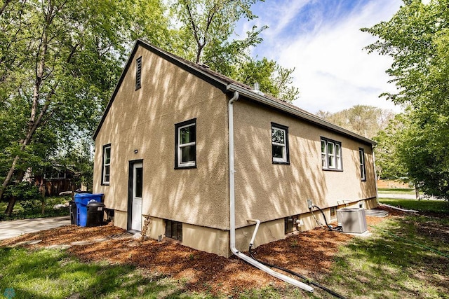 1342 10th St N, Fargo, ND 58102 - view of property exterior with stucco siding