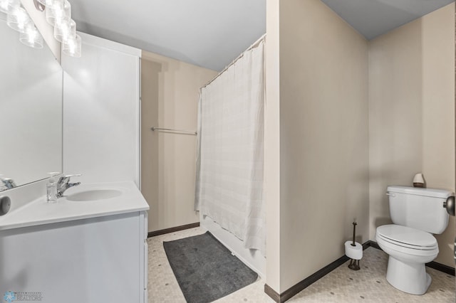 6718 69th Ave S, Horace, ND 58047 - bathroom featuring toilet, vanity, baseboards, and curtained shower