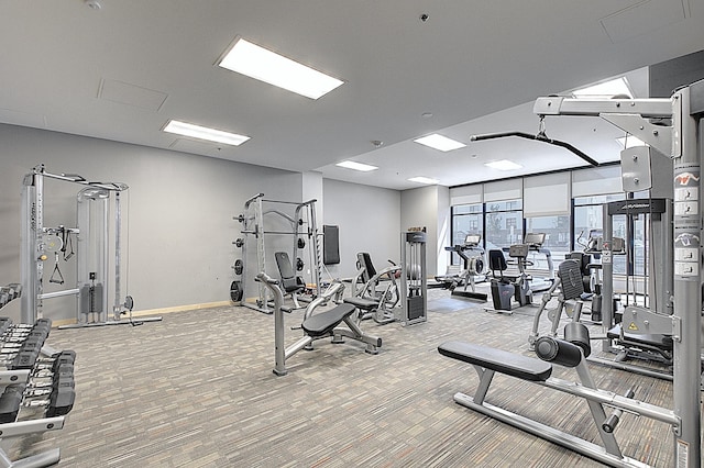 740 Portland Ave Unit 1005, Minneapolis, MN 55415 - exercise room with carpet flooring and baseboards