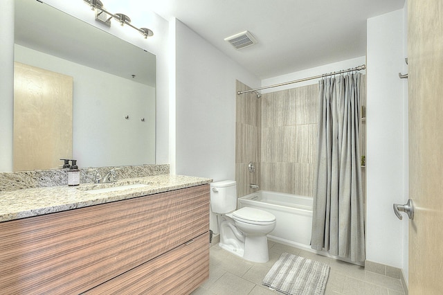 740 Portland Ave Unit 1005, Minneapolis, MN 55415 - bathroom with toilet, vanity, shower / tub combo, and tile patterned floors