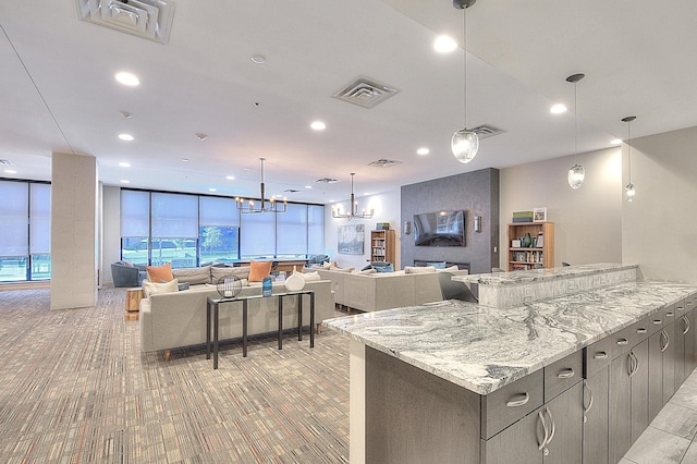 740 Portland Ave Unit 1005, Minneapolis, MN 55415 - kitchen with light carpet, a chandelier, floor to ceiling windows, recessed lighting, and open floor plan