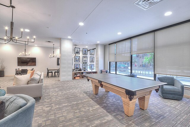 740 Portland Ave Unit 1005, Minneapolis, MN 55415 - game room with a chandelier, carpet, and recessed lighting