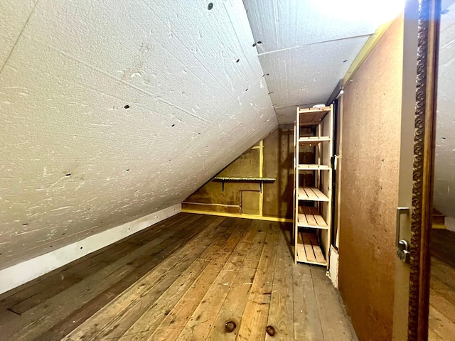 508 2nd Ave, Goodhue, MN 55027 - additional living space with hardwood / wood-style floors and vaulted ceiling