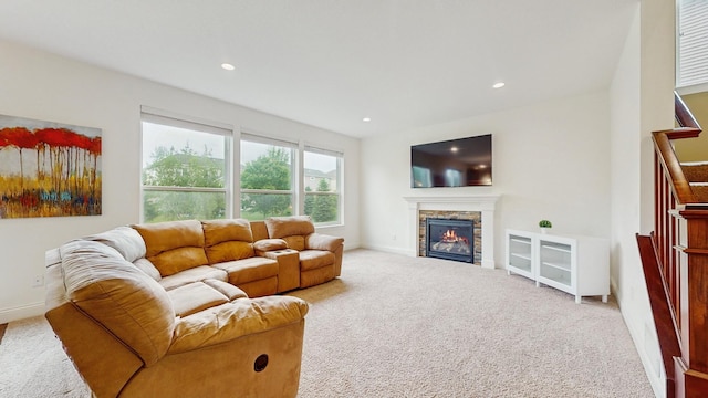 11330 Harness Rd, Woodbury, MN 55129 - carpeted living room featuring a fireplace, recessed lighting, baseboards, and stairway