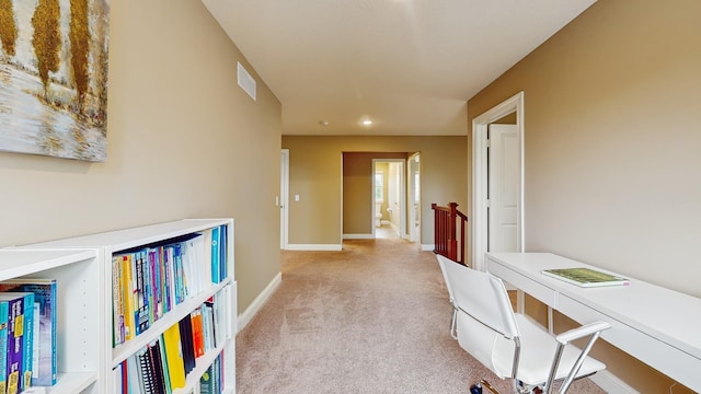 11330 Harness Rd, Woodbury, MN 55129 - hall featuring light colored carpet, an upstairs landing, baseboards, recessed lighting, and a desk