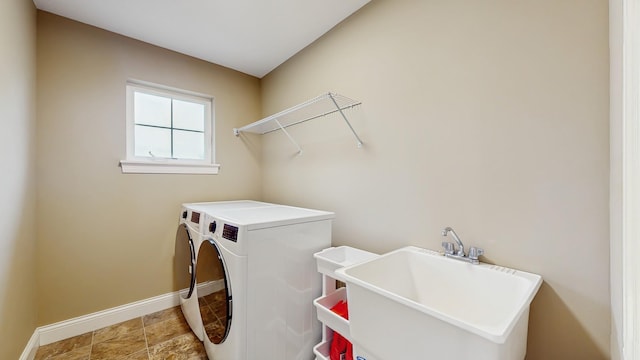 11330 Harness Rd, Woodbury, MN 55129 - washroom with separate washer and dryer and baseboards
