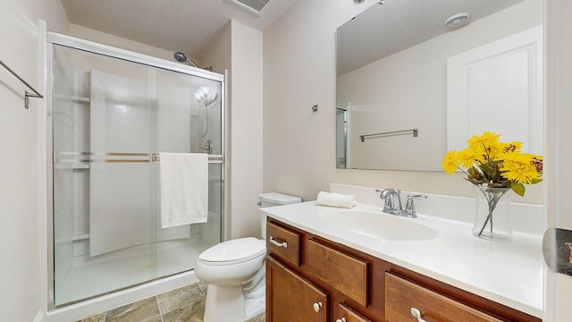 11330 Harness Rd, Woodbury, MN 55129 - full bathroom featuring vanity, a stall shower, and toilet