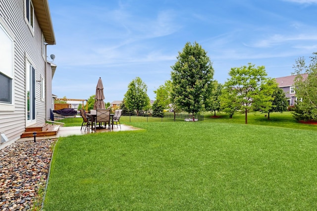11330 Harness Rd, Woodbury, MN 55129 - view of yard with a patio