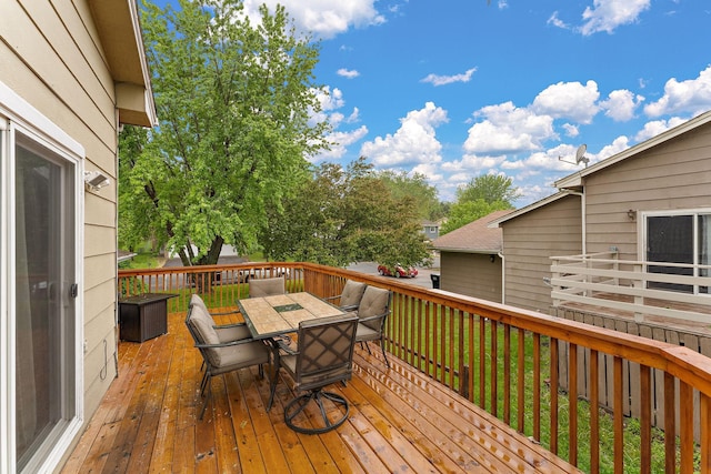 1533 Roundhouse Cir, Shakopee, MN 55379 - wooden terrace featuring outdoor dining space and a yard