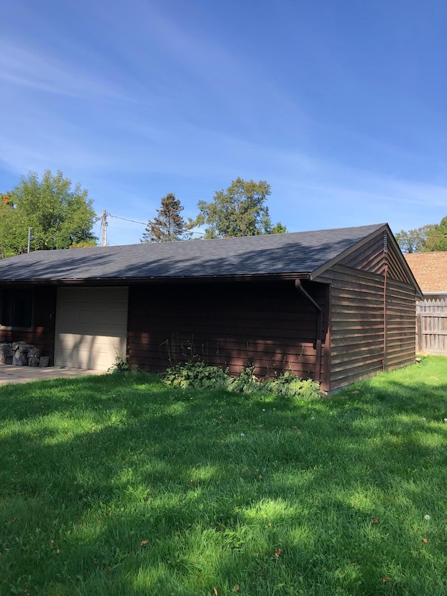 43923 Vista Rd, Isle, MN 56342 - view of side of home with a garage