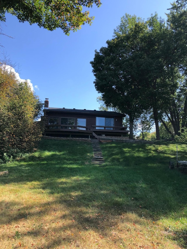 43923 Vista Rd, Isle, MN 56342 - view of green lawn featuring a deck