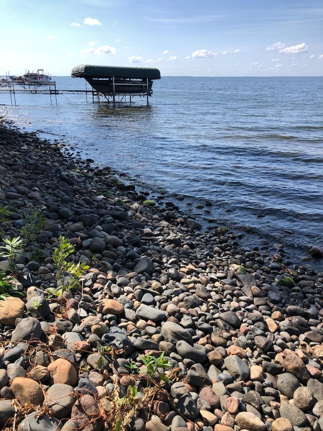 43923 Vista Rd, Isle, MN 56342 - dock featuring boat lift and a water view