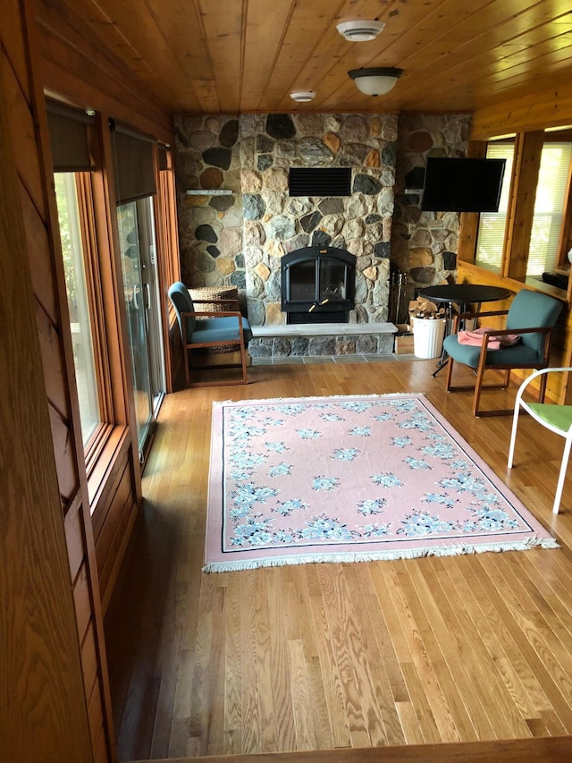 43923 Vista Rd, Isle, MN 56342 - living area featuring wood ceiling, healthy amount of natural light, and hardwood / wood-style flooring