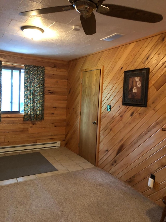 43923 Vista Rd, Isle, MN 56342 - hallway featuring a baseboard radiator, wooden walls, and carpet