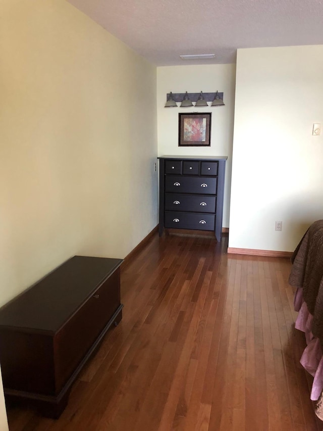 43923 Vista Rd, Isle, MN 56342 - bedroom with dark wood-type flooring and baseboards
