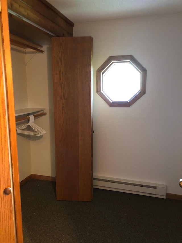 43923 Vista Rd, Isle, MN 56342 - closet featuring a baseboard radiator