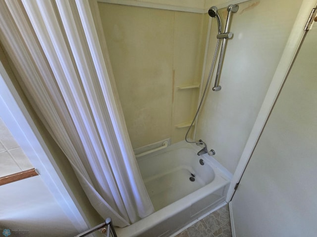 310 20th St N, Fargo, ND 58102 - bathroom featuring shower / bathtub combination with curtain