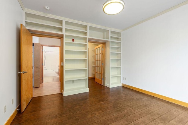 4500 Chicago Ave Unit 103, Minneapolis, MN 55407 - empty room with dark wood-type flooring, a smoke detector, ornamental molding, baseboards, and built in features