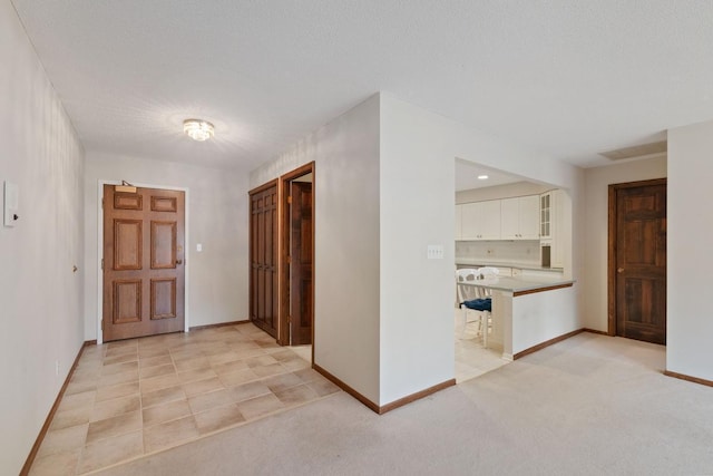 5100 France Ave S Unit 305, Edina, MN 55410 - foyer entrance featuring baseboards and light carpet