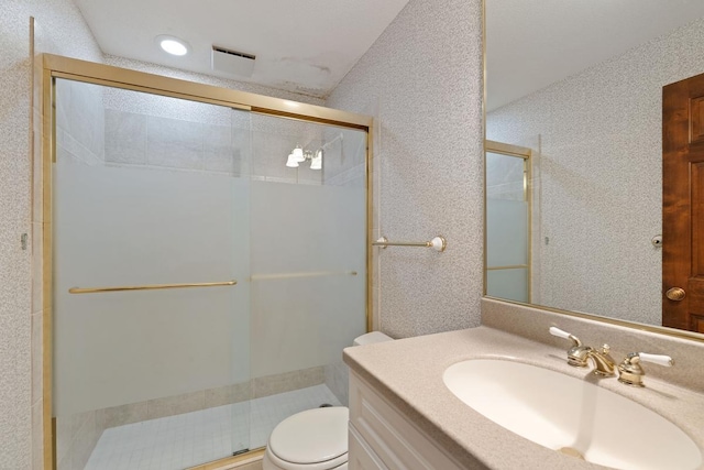 5100 France Ave S Unit 305, Edina, MN 55410 - bathroom featuring toilet, a shower stall, and vanity