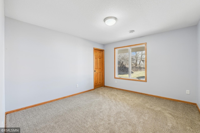20595 Kearney Path, Lakeville, MN 55044 - empty room featuring carpet flooring and baseboards