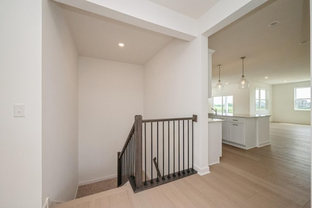 9729 49th St NE, Saint Michael, MN 55376 - staircase with wood finished floors and recessed lighting