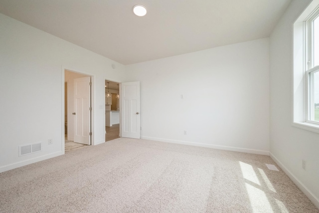 9729 49th St NE, Saint Michael, MN 55376 - spare room with light colored carpet and baseboards