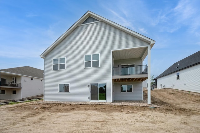 9729 49th St NE, Saint Michael, MN 55376 - rear view of house with a balcony