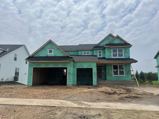4564 Obsidian Way, Victoria, MN 55386 - unfinished property with a garage, driveway, covered porch, and a shingled roof
