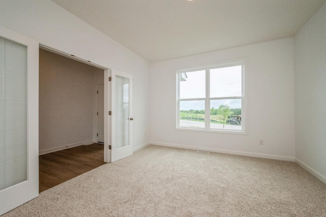 535 Rolling Hills Ln, Delano, MN 55328 - carpeted empty room featuring french doors and baseboards