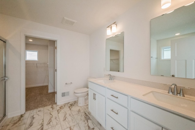 535 Rolling Hills Ln, Delano, MN 55328 - full bath featuring marble finish flooring, an enclosed shower, double vanity, a walk in closet, and healthy amount of natural light