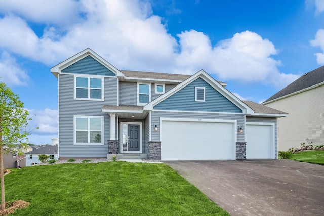 535 Rolling Hills Ln, Delano, MN 55328 - view of front facade with asphalt driveway, a front lawn, an attached garage, stone siding, and a shingled roof