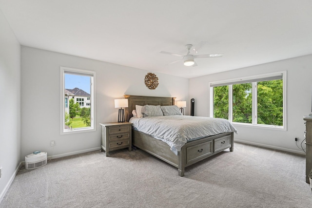 14075 45th Ct NE, Saint Michael, MN 55376 - bedroom featuring carpet floors, baseboards, and a ceiling fan
