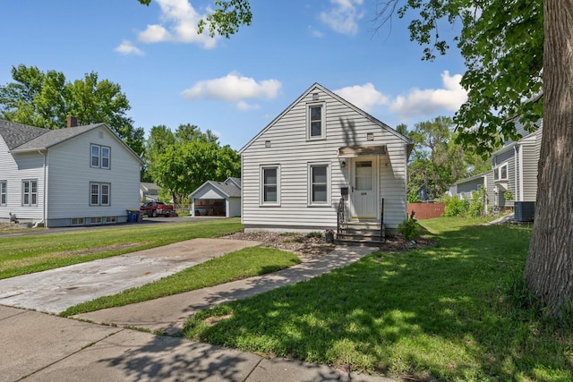 624 2nd St NE, Faribault, MN 55021 - view of front of property featuring a front lawn and central AC