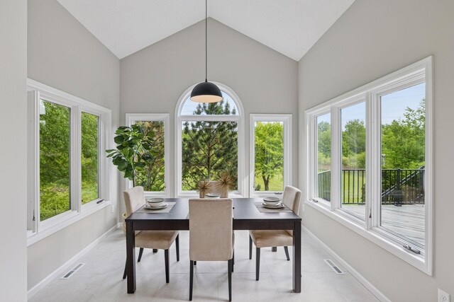 17032 Valley Dr NW, Andover, MN 55304 - sunroom / solarium featuring healthy amount of natural light and vaulted ceiling