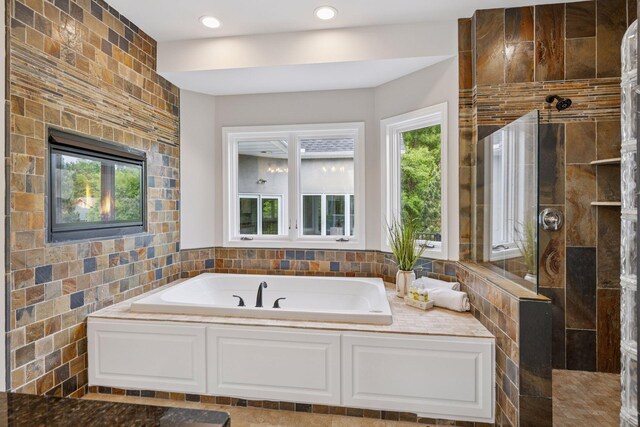 17032 Valley Dr NW, Andover, MN 55304 - bathroom featuring a garden tub and walk in shower