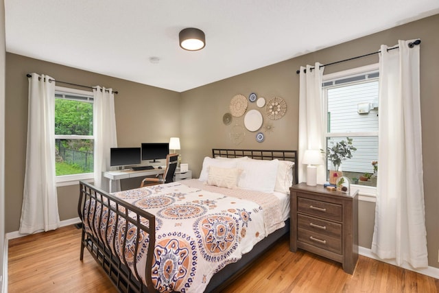 3350 Virginia Ave S, Saint Louis Park, MN 55426 - bedroom featuring light wood-style flooring and baseboards